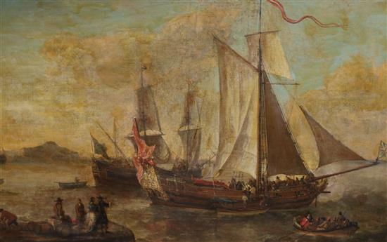 An 18th century oil on canvas of shipping figures in a harbour, 52 x 82cm